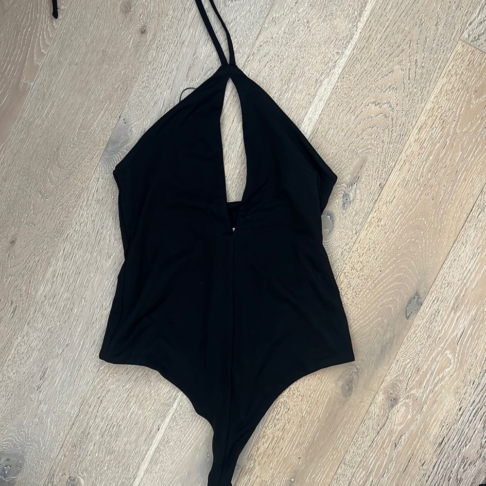 Black body suit with key hole and halter tie around